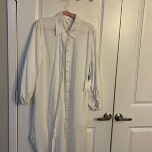For Cynthia White Button-Up Shirt Dress
Size large with rhinestone buttons